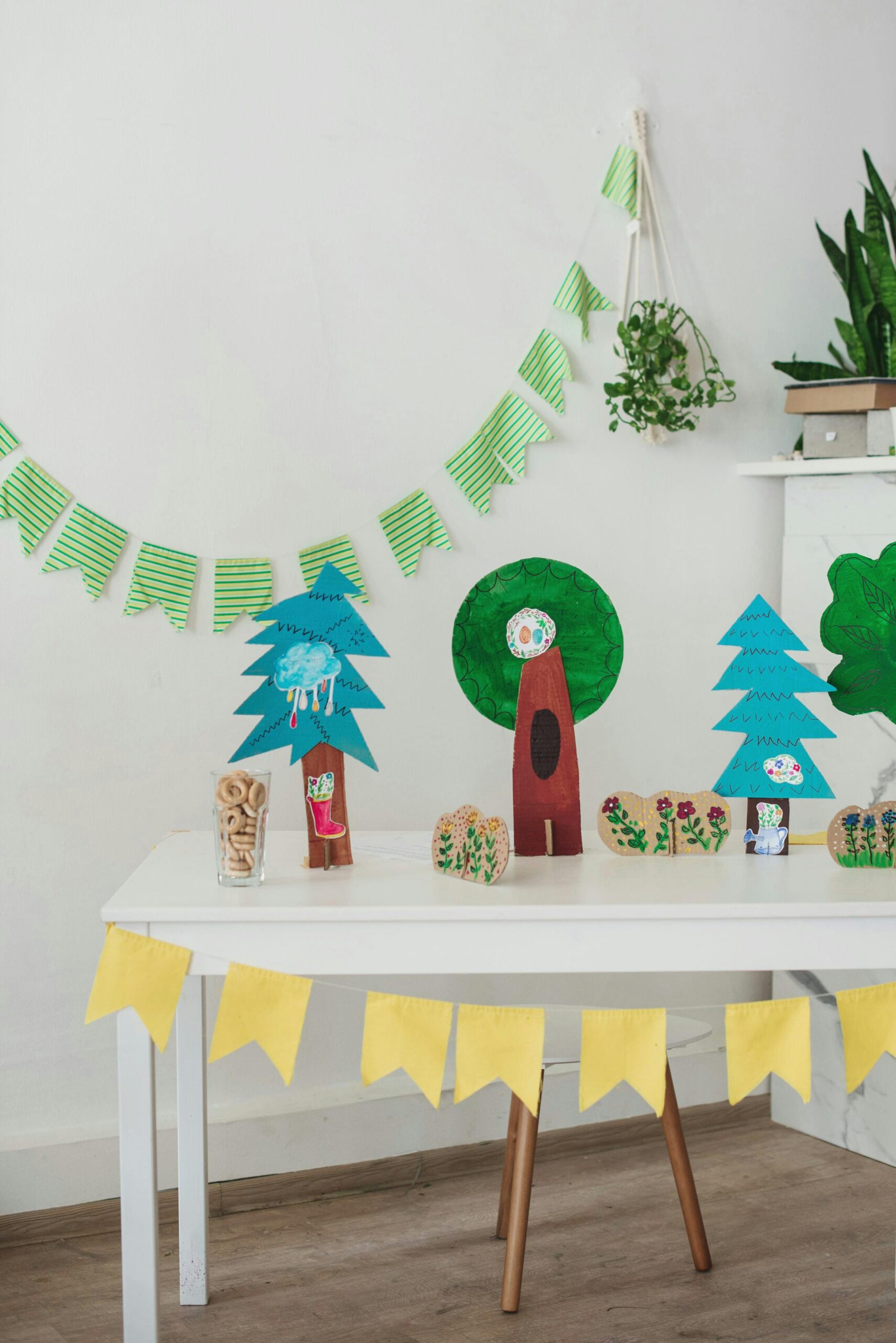 Colorful handmade decorations for a festive children's party indoors.